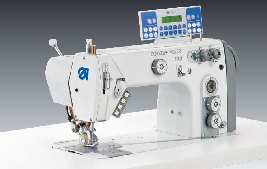 Single needle two thread-chainstitch machine with top puller feed, thread trimmer and integrated sewing drive